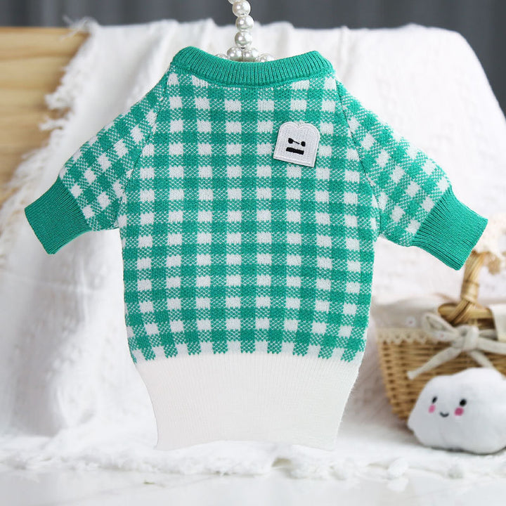 warm pet sweaters in green and white checkered design, perfect for keeping pets cozy in colder weather.