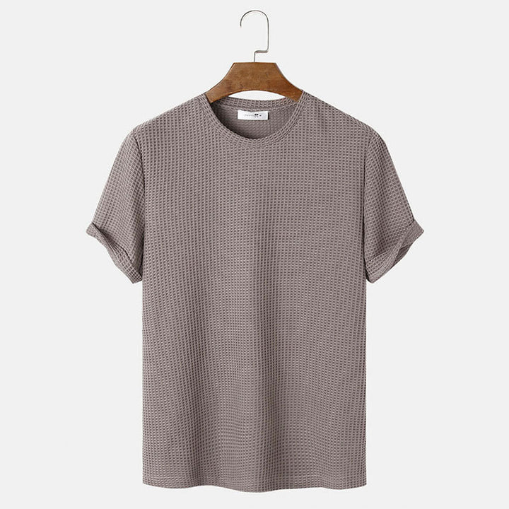 men summer solid color t-shirts in beige color, featuring a Henry collar and slim fit, perfect for summer wear.