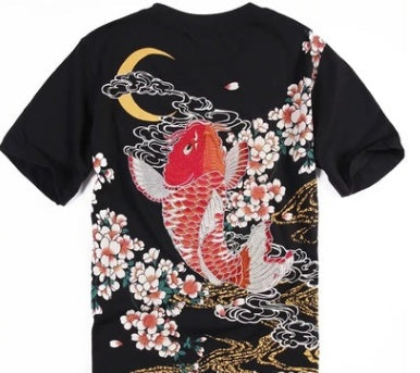 unique embroidered t-shirts collection featuring vibrant koi fish and floral designs on a black background.