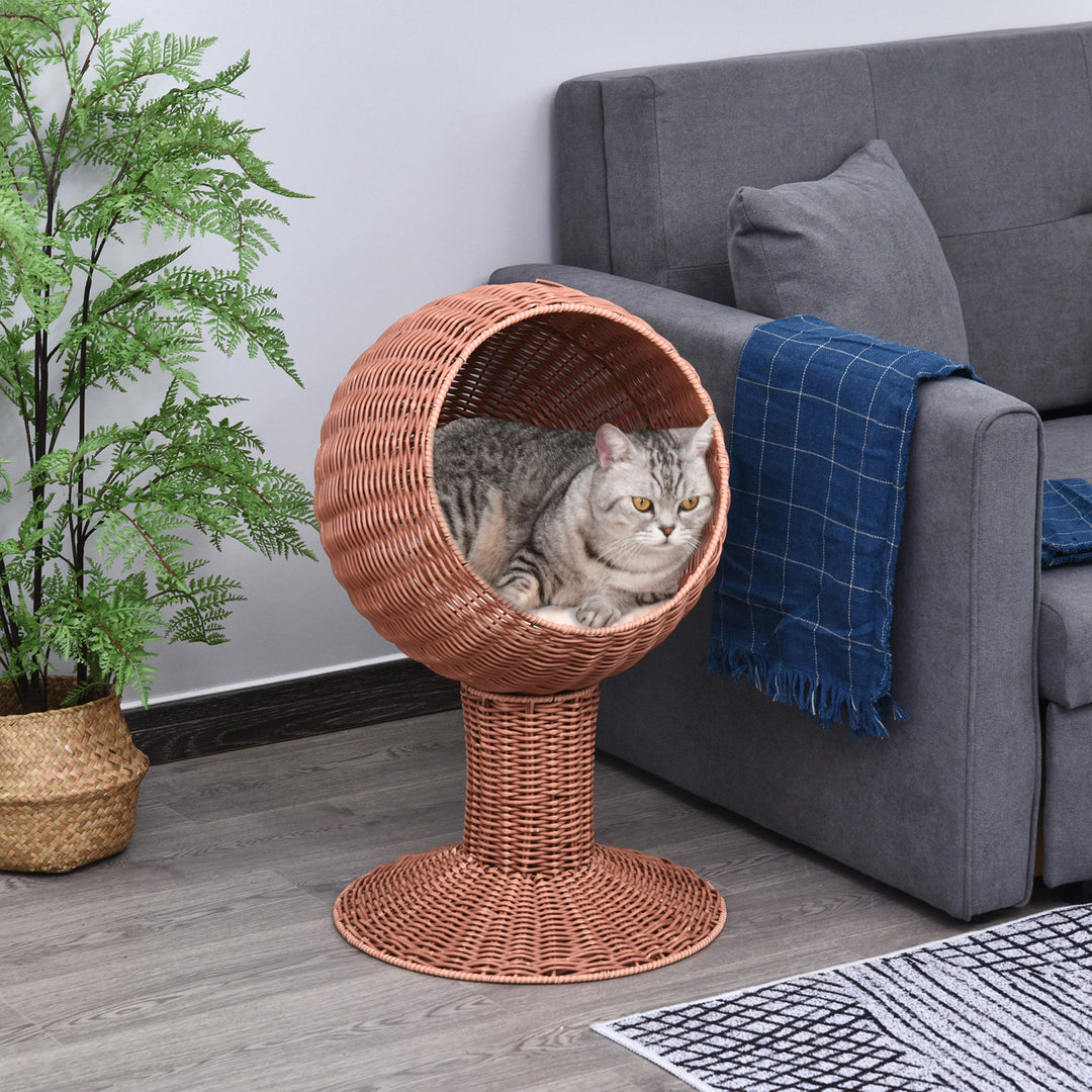 Elevated rotatable cat bed with a cozy cat peeking out, designed for comfort and observation.