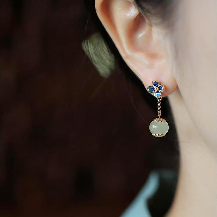 Flower Four Leaf Clover Ear Studs featuring gold plating and colorful gemstones, perfect for a stylish accessory.