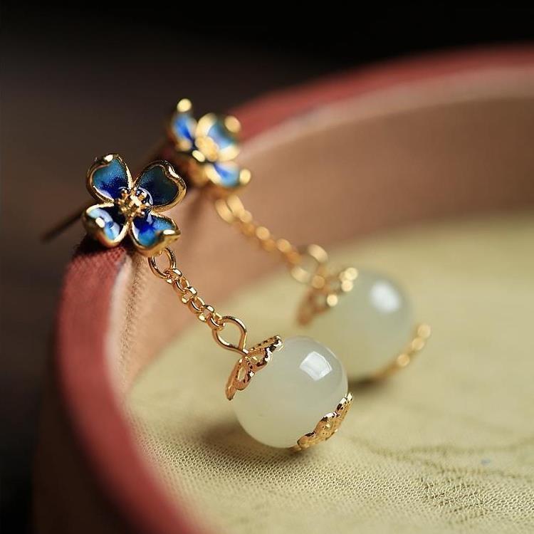 Flower Four Leaf Clover Ear Studs featuring gold-plated inlaid gemstones and flower designs, perfect for adding charm to any outfit.