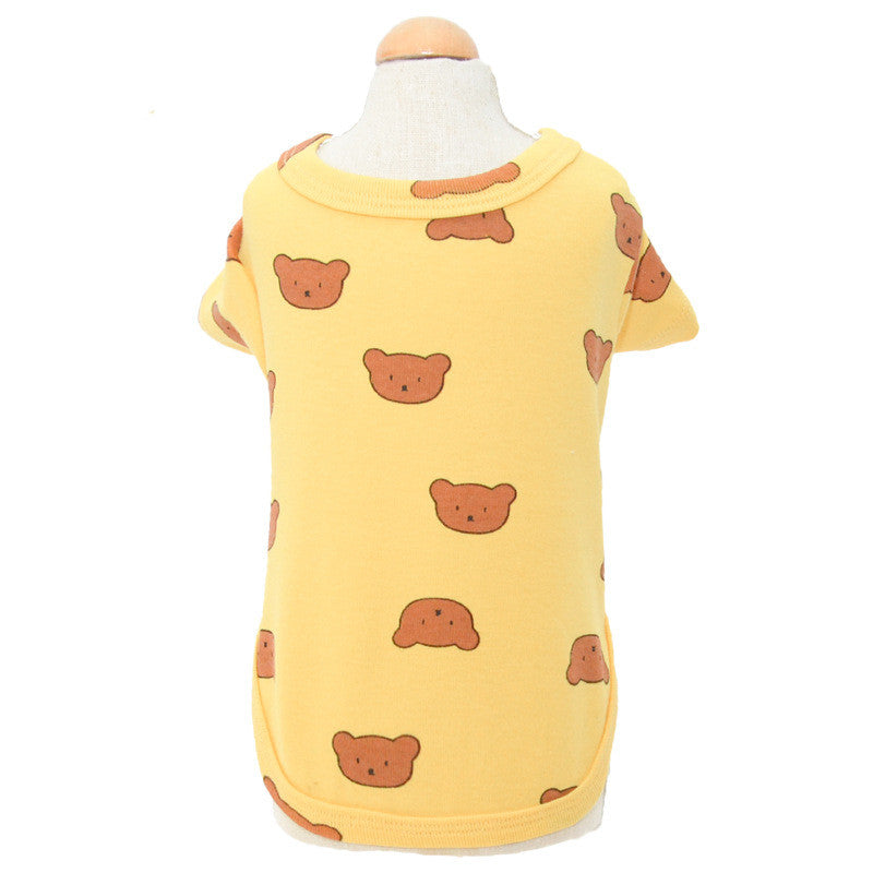 Dog shirt with bear prints on a yellow background displayed on a mannequin.