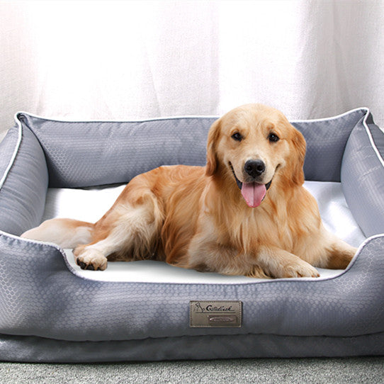 Golden Retriever relaxing on a dark grey removable dog bed for pets, featuring a soft and comfortable design.