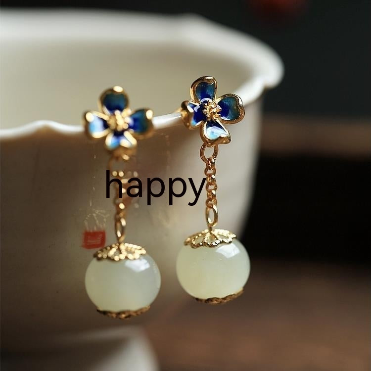 Flower Four Leaf Clover Ear Studs featuring gold plating and semi-precious stones, adding charm to any outfit.