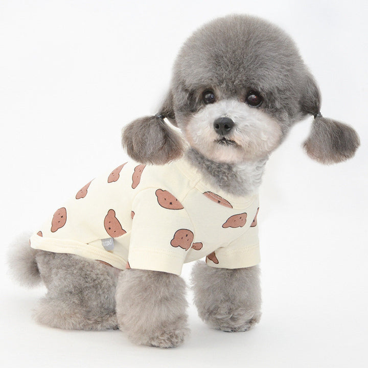Adorable dog wearing a cute shirt with potato prints, showcasing pet fashion and style.