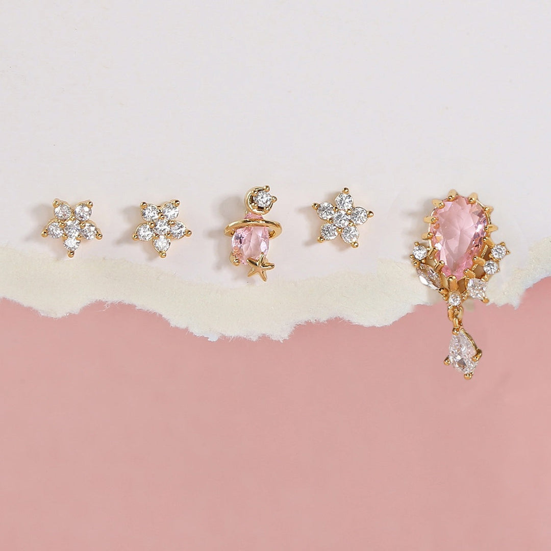 Gold zircon flower ear studs featuring a charming flower shape adorned with sparkling zircon stones.